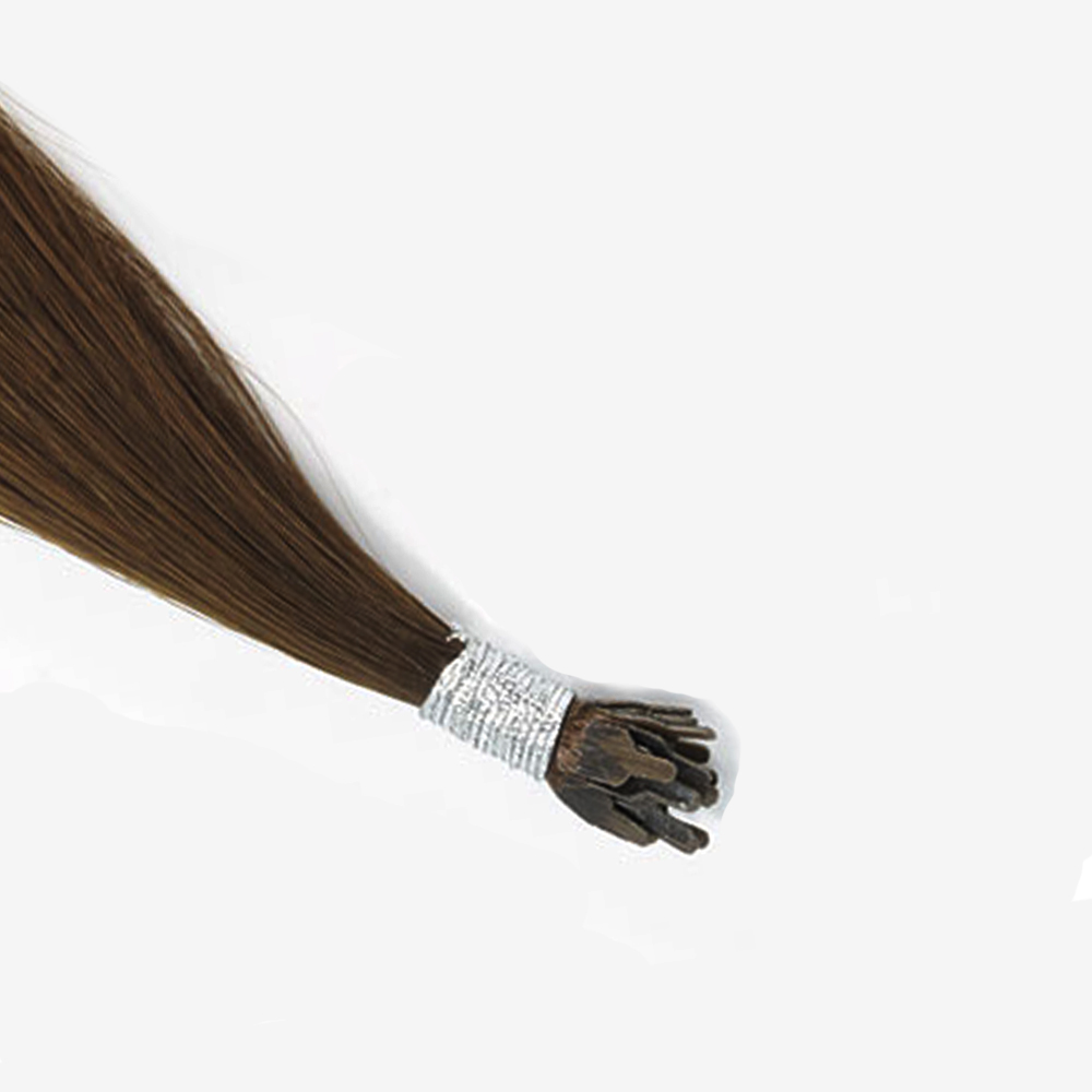 Products Extreme close-up of premium 100% virgin remy cuticle human hair reinforced thread wrapped Y-tip keratin extensions in brown for fast B2B wholesale salons.